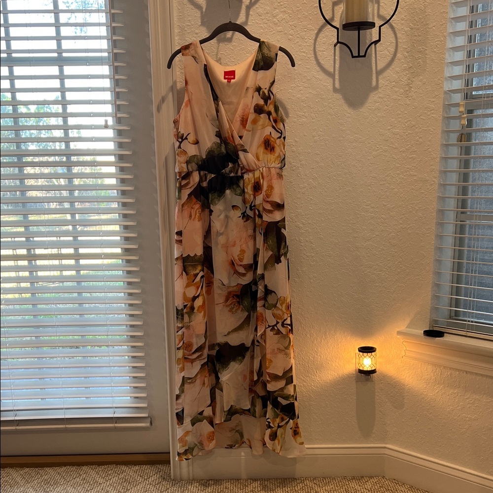 Elegant Floral Maxi Dress in Sheer Peach and Green Cross Flutter Design